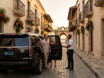 A driver assists a couple from a black private taxi SUV on a historic colonial street decorated for Christmas in the Dominican Republic.