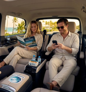 Happy couple relaxing in a luxury airport transfer vehicle in Punta Cana
