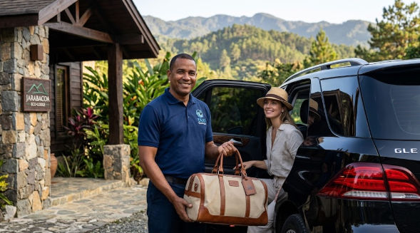 Private taxi driver helping a passenger with luggage at a Jarabacoa eco lodge
