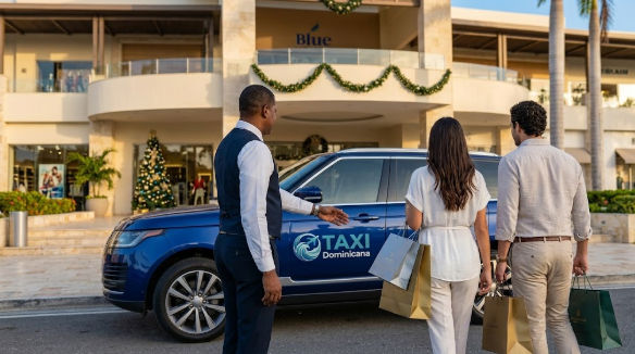 Chauffeur opening the door of a blue SUV for a couple with shopping bags at Blue Mall Punta Cana during the holidays