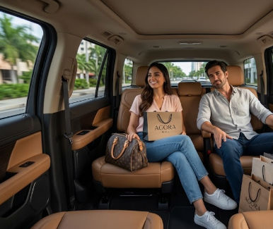 Couple relaxing in a comfortable private transfer with shopping bags after visiting Agora Mall Santo Domingo