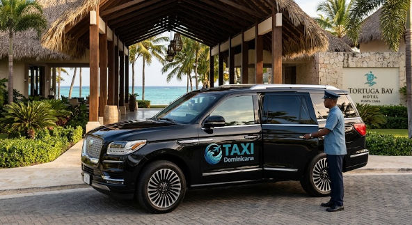Chofer de Taxi Dominicana con SUV negro en Tortuga Bay Hotel