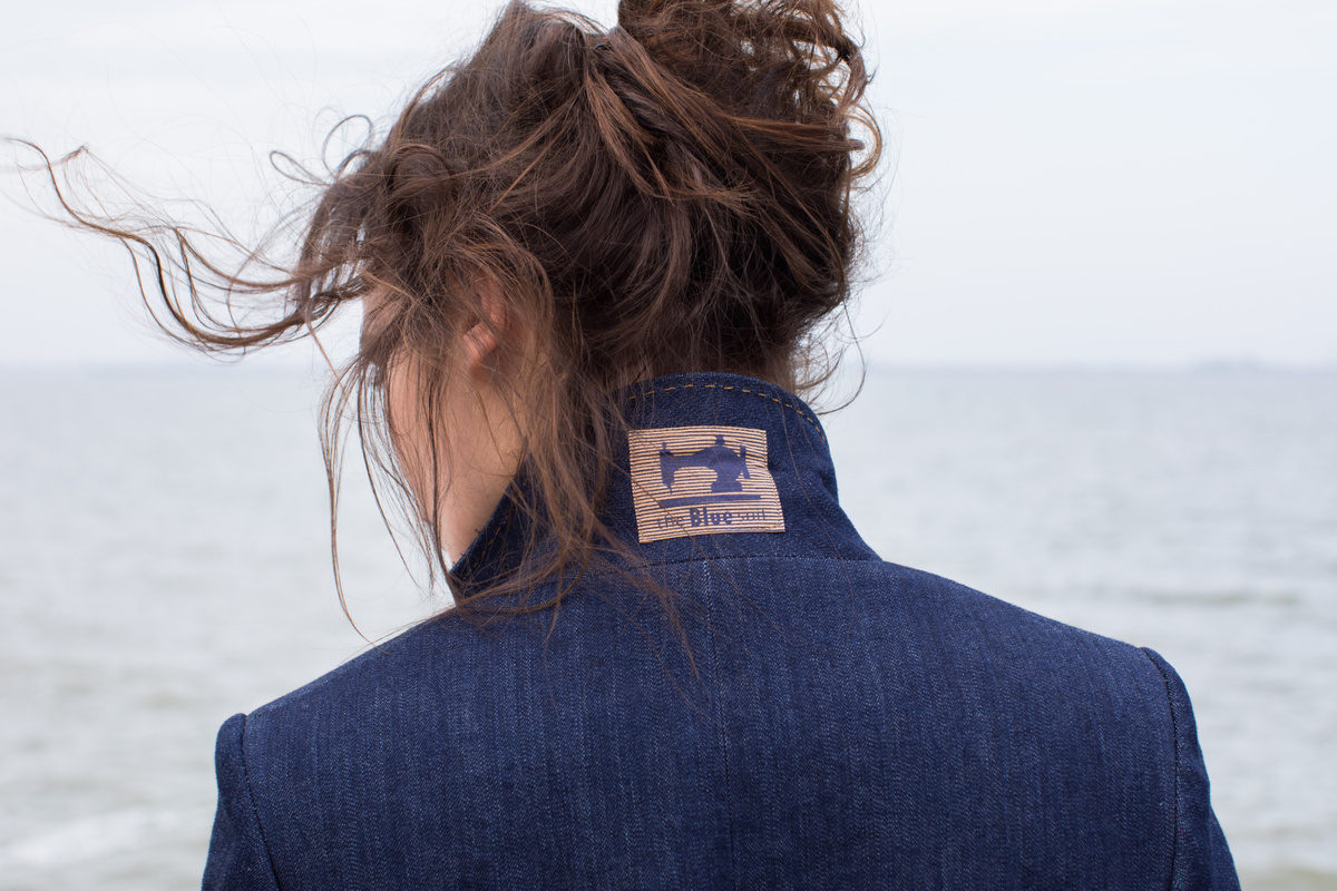 The Blue suit COSH LISA jacket from behind sea 4 Karen Rauschenbach