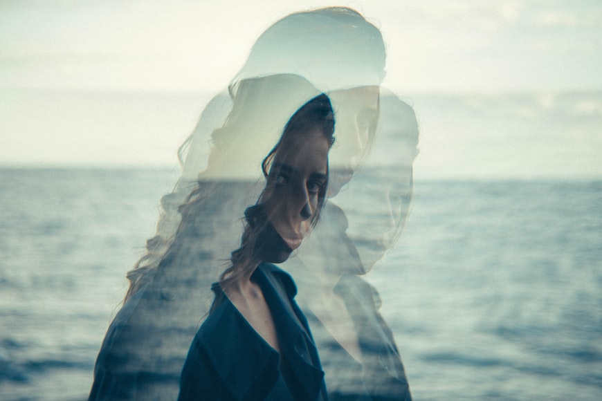 three-of-me Woman with multiple reflections of her body, wary of timeboxing.