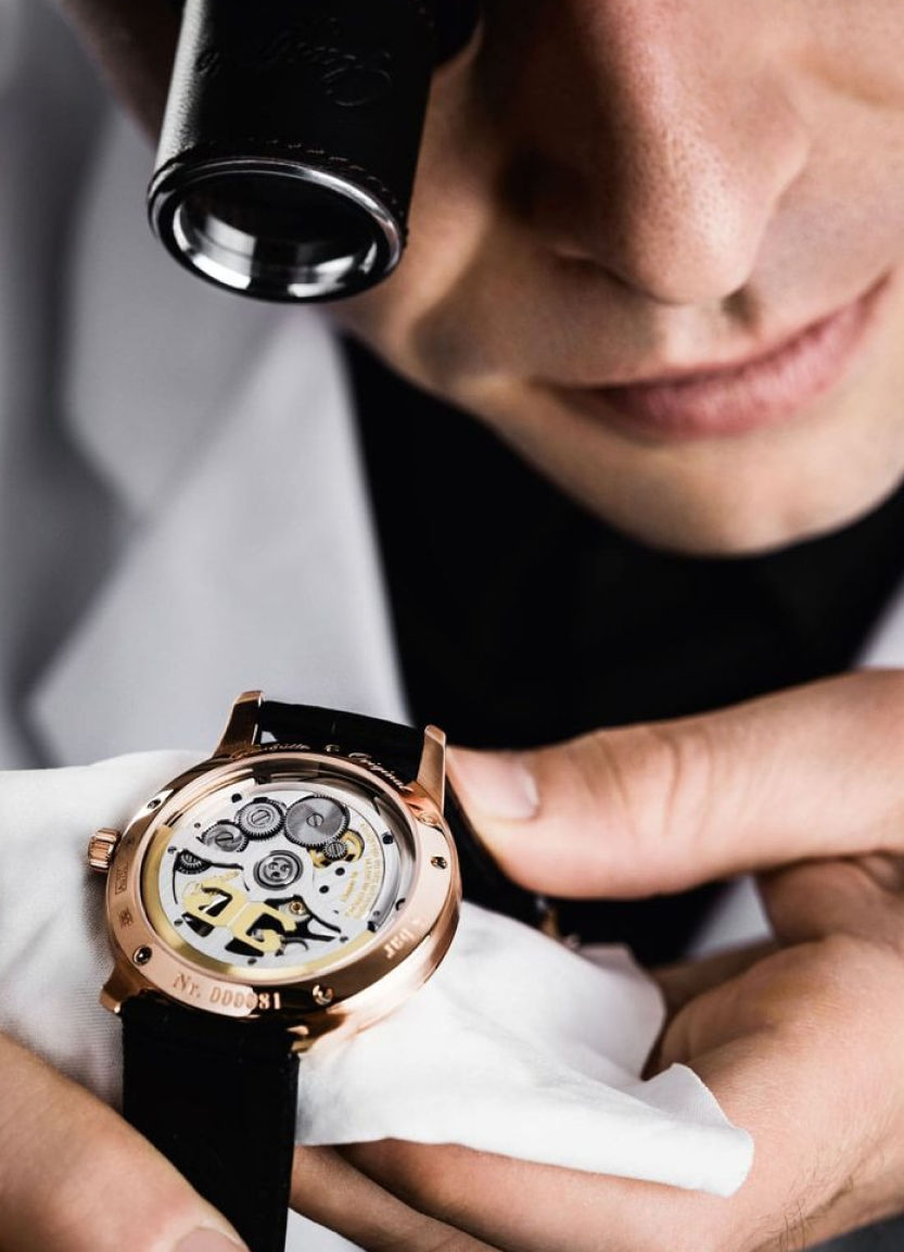 a man looking at the watch