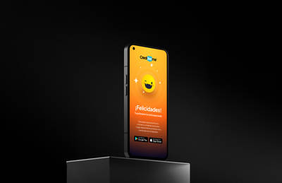Smartphone mockup displaying a vibrant orange celebratory app interface with mascot and download badges.