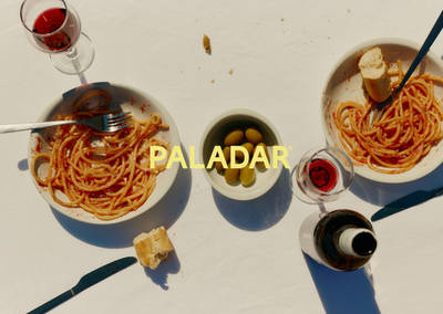 Paladar brand refresh showing the visual identity update on a MacBook Pro mockup.