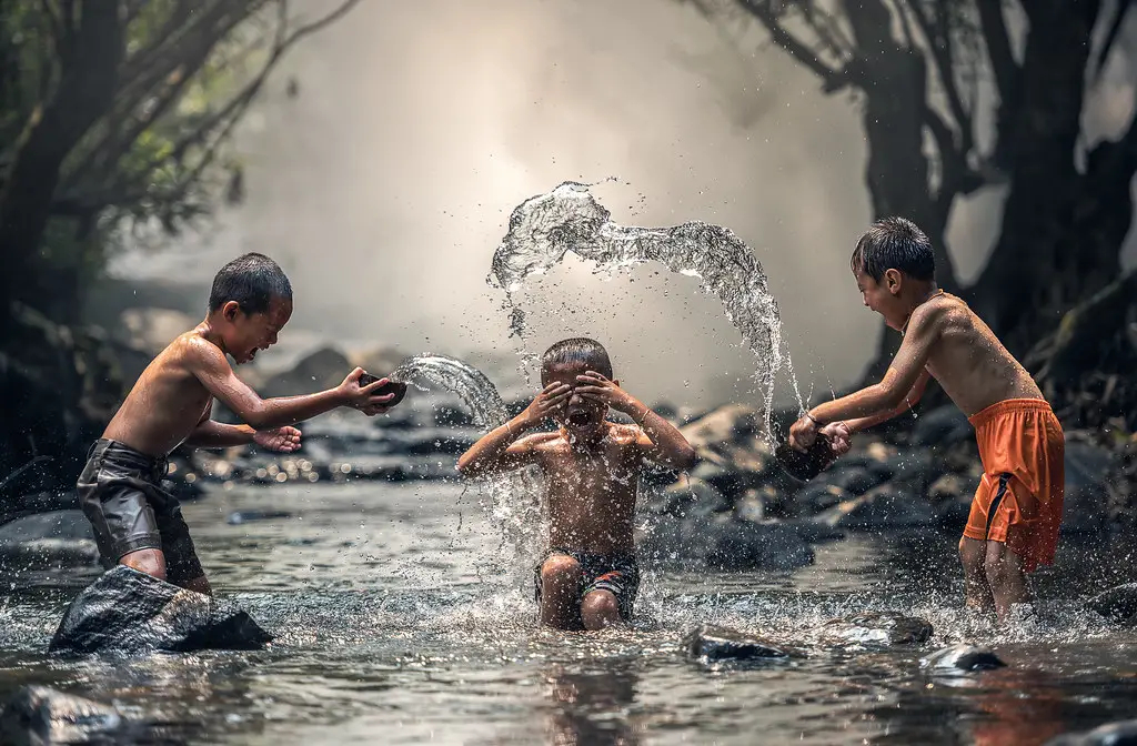 N13_9750 | Three boy joyful with splashing | Sasin Tipchai | Flickr