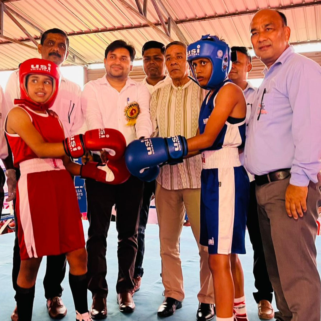 Two boxers sparring in a ring.