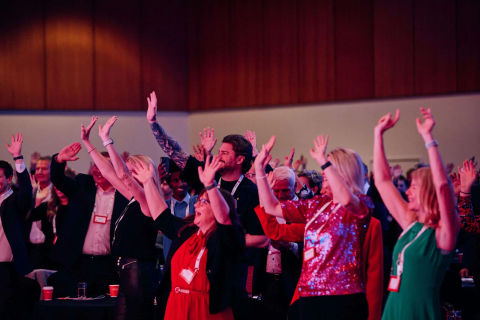 The BFA event crowd hand in the air