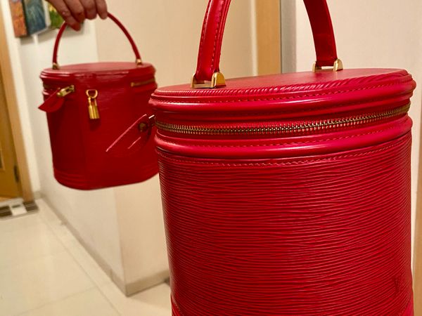 Louis Vuitton červená kabelka s uzamykatelným zipem