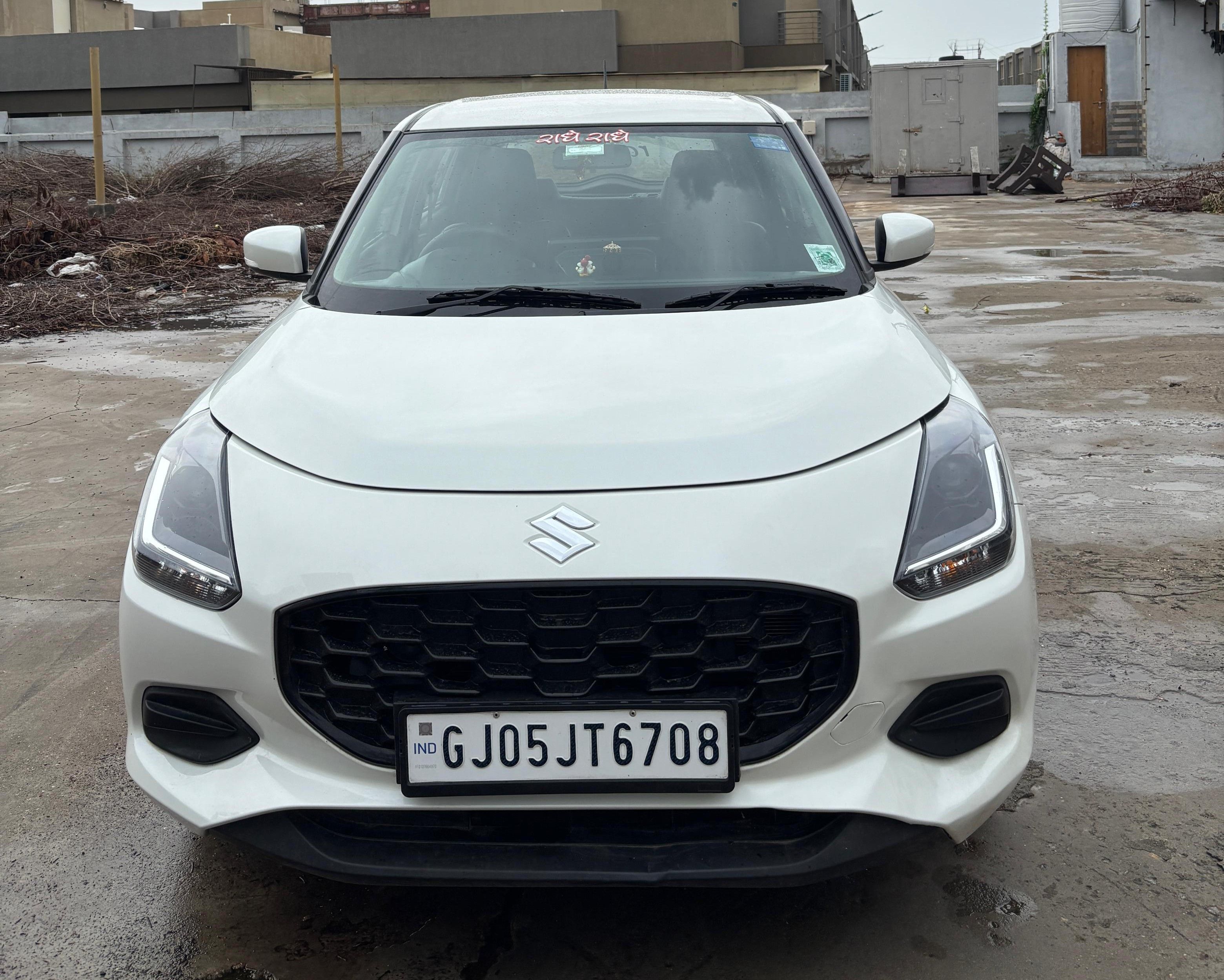 Maruti Suzuki Swift White - Economy car rental Ahmedabad