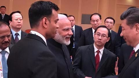 Modi and Xi shake hands amid tensed relations