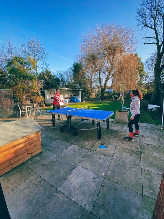 Dylan and Riley play a game of ping pong on Christmas