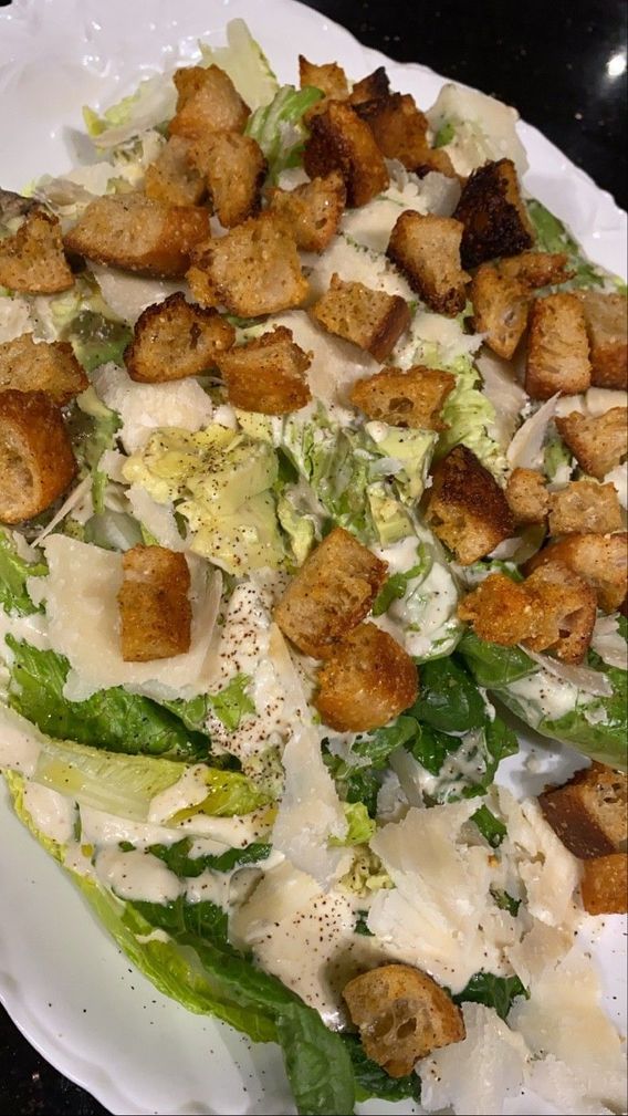 Caesar salad with long stem romaine lettuce, shaved parmesean, fresh & crisp sourdough croutons and homemade caesar dressing (no anchovies!)