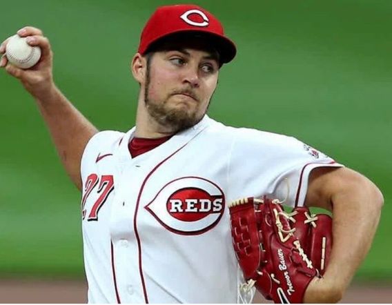 Cincinnati Reds starting pitcher Trevor Bauer delivers a pitch against the Milwaukee Brewers.
KAREEM ELGAZZAR, CINCINNATI ENQUIRER