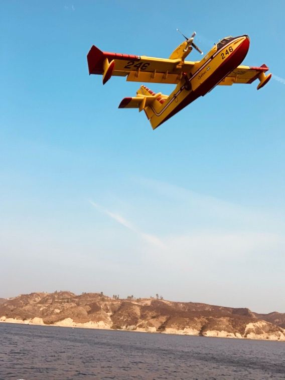 As we’re in the midst of a few California wildfires, we got to witness the AirTankers picking up water right next to us!