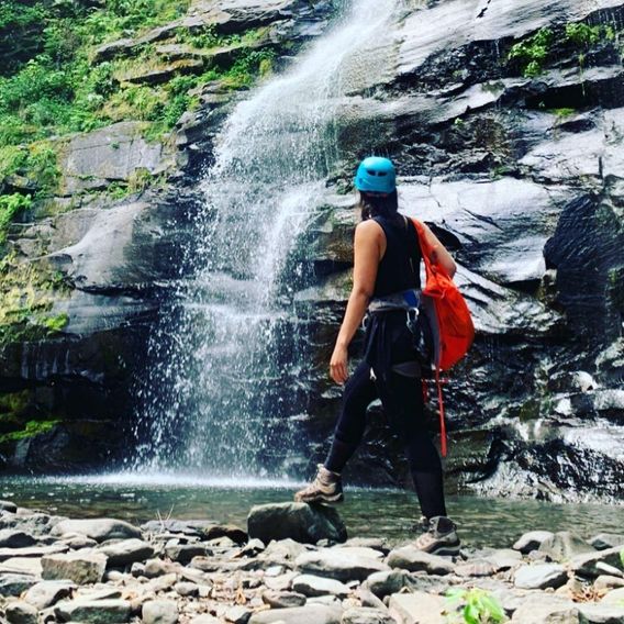 Scoping out the first of many waterfalls to climb that day. 