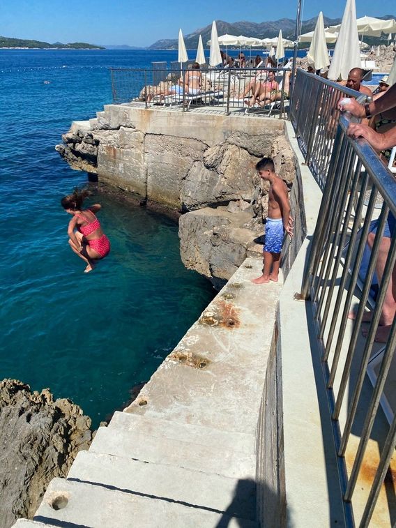 Cliff jumping at our pool