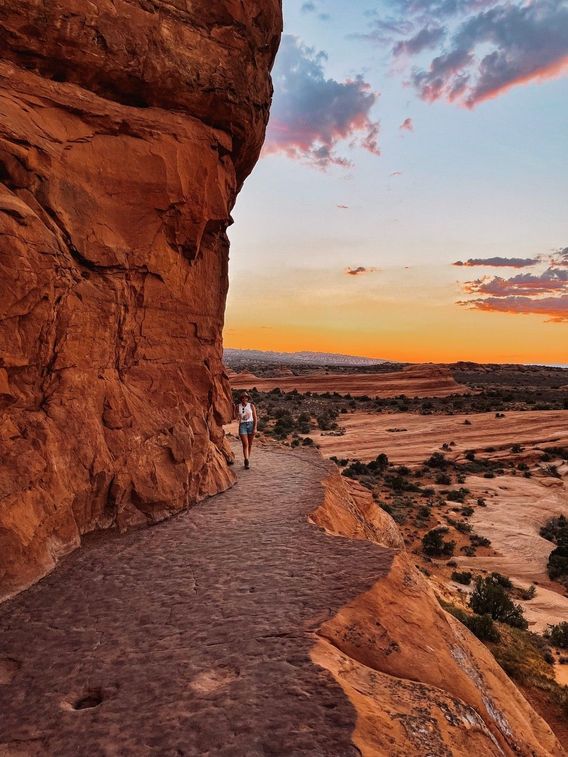 The trail leading to Delicate Arch at sunset