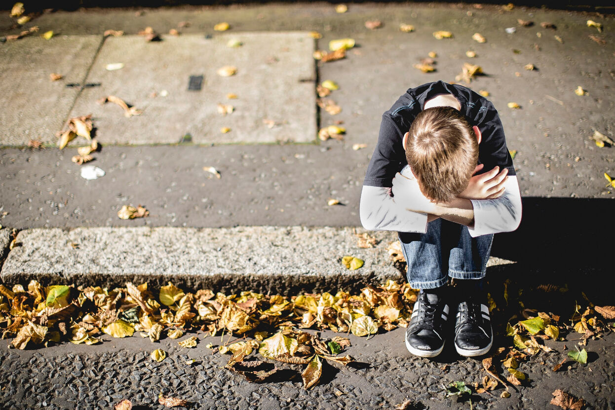 Image of Child Distressed on Side of Street