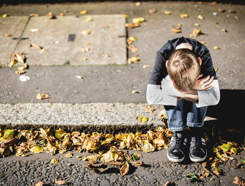 Image of Child Distressed on Side of Street