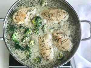 chicken breast and broccoli in a roux