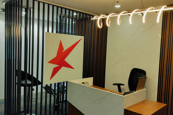 Stylish Reception Design with Warm Lighting and Stylish Wall Decor