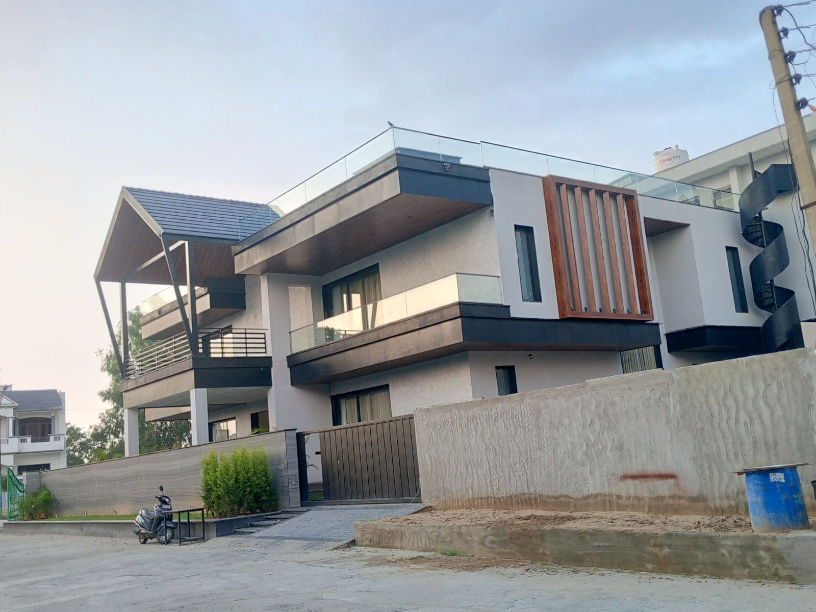 Modern Home Exterior Designs by Unique Infra