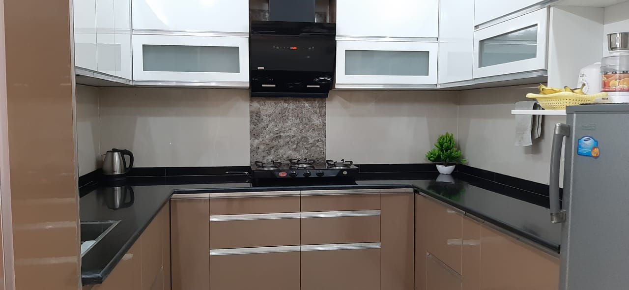 Elegant U-Shaped Modular Kitchen Design by Unique Space Craft