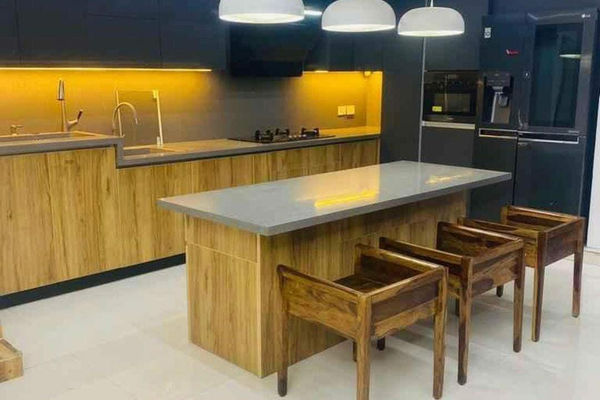 Elegant Island Kitchen Design with Brown Cabinets & Lemon-Yellow Lighting