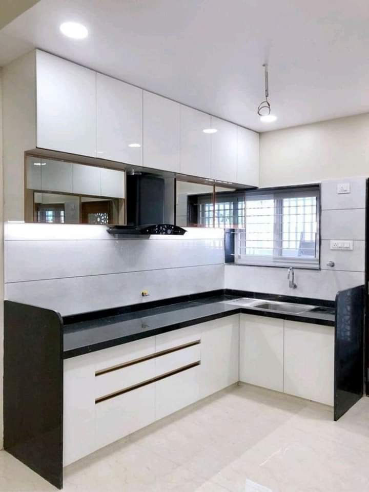 Modern L-Shaped Kitchen Design with White Finish