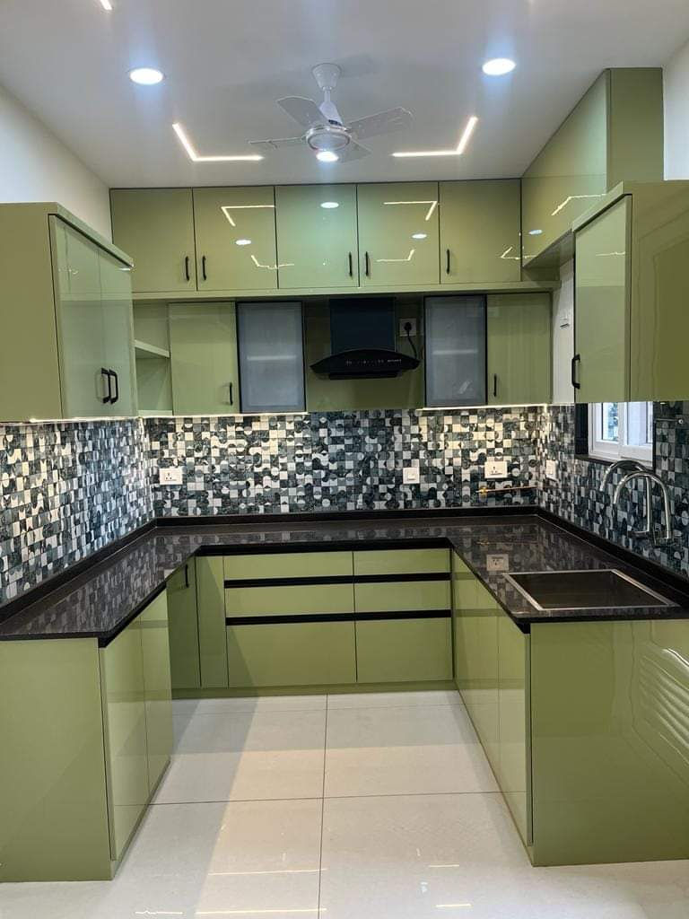 Elegant U-Shaped Modular Kitchen with Matching Cabinets and Granite Countertop