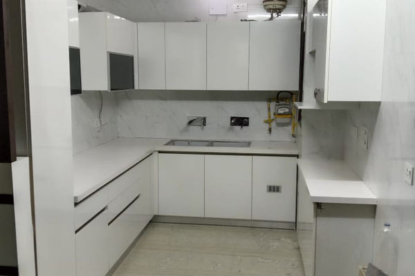 Elegant White U-Shaped Modular Kitchen by Royal Kitchen Interiors