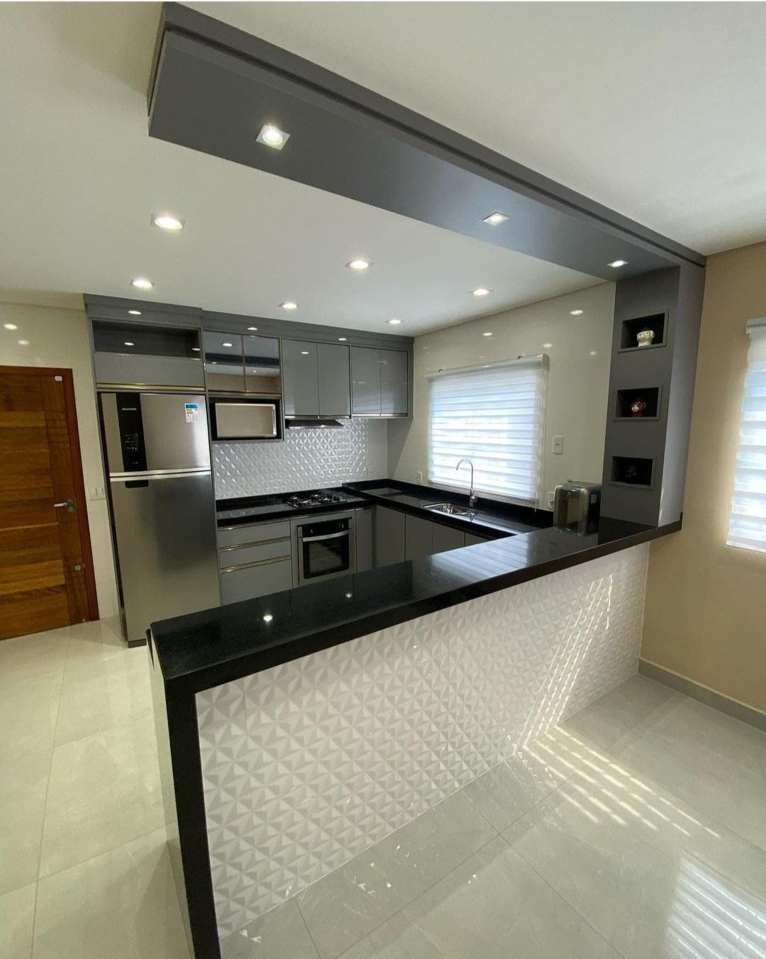 Modern U-Shaped Modular Kitchen Design with Open Concept Living Area