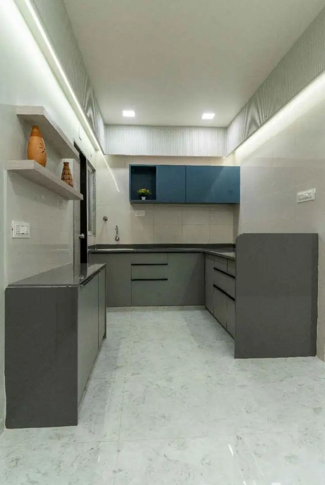 Modern L-Shaped Modular Kitchen with Gray and Dark Green Cabinets