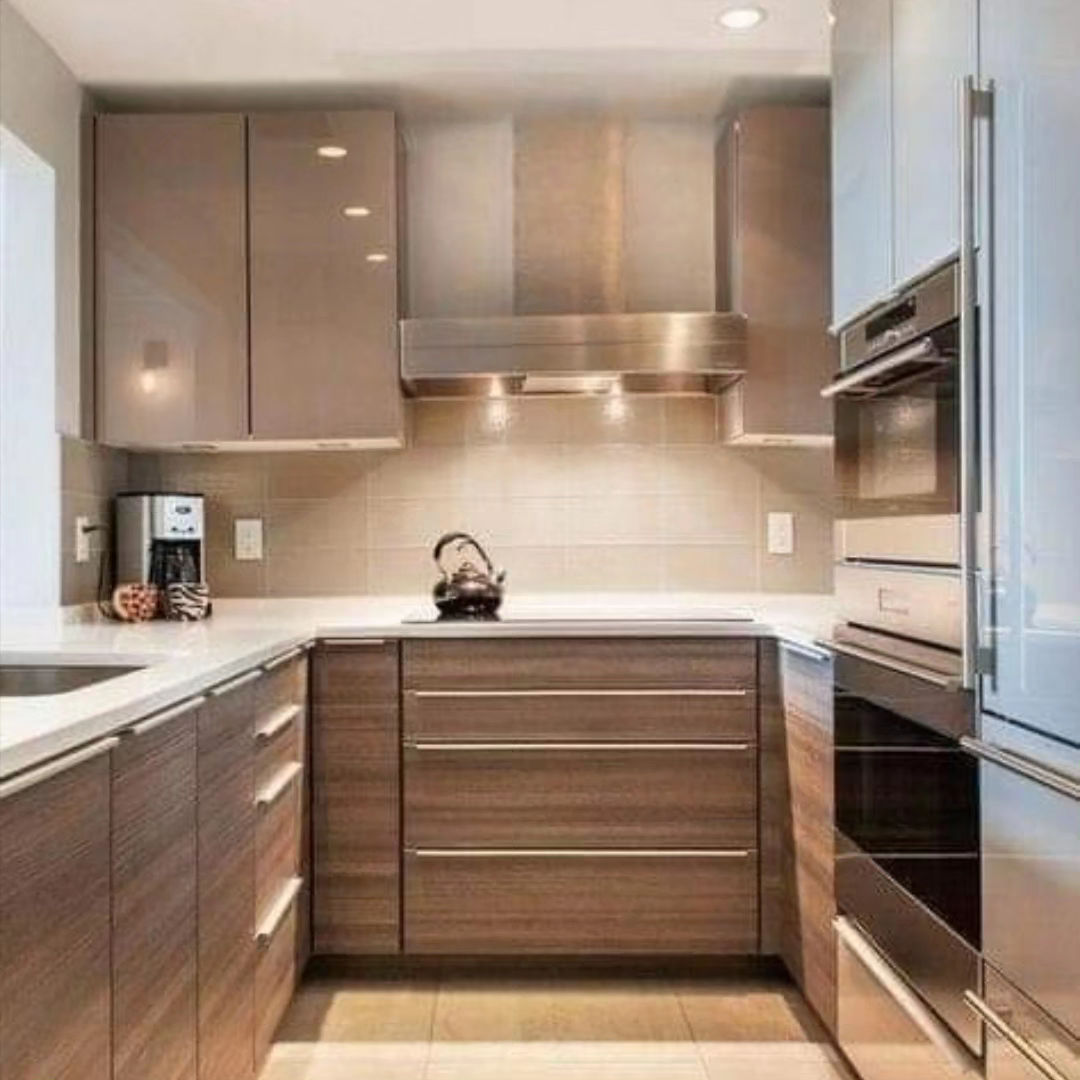 Medium Brown U-Shaped Kitchen Design with Stylish Chimney