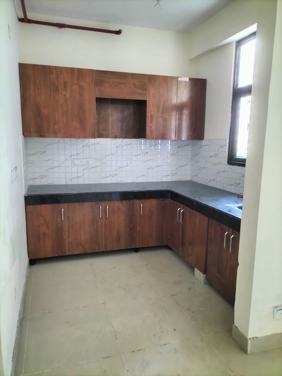 L-Shaped Modular Kitchen with Brown Wooden Cabinets and Granite Countertop
