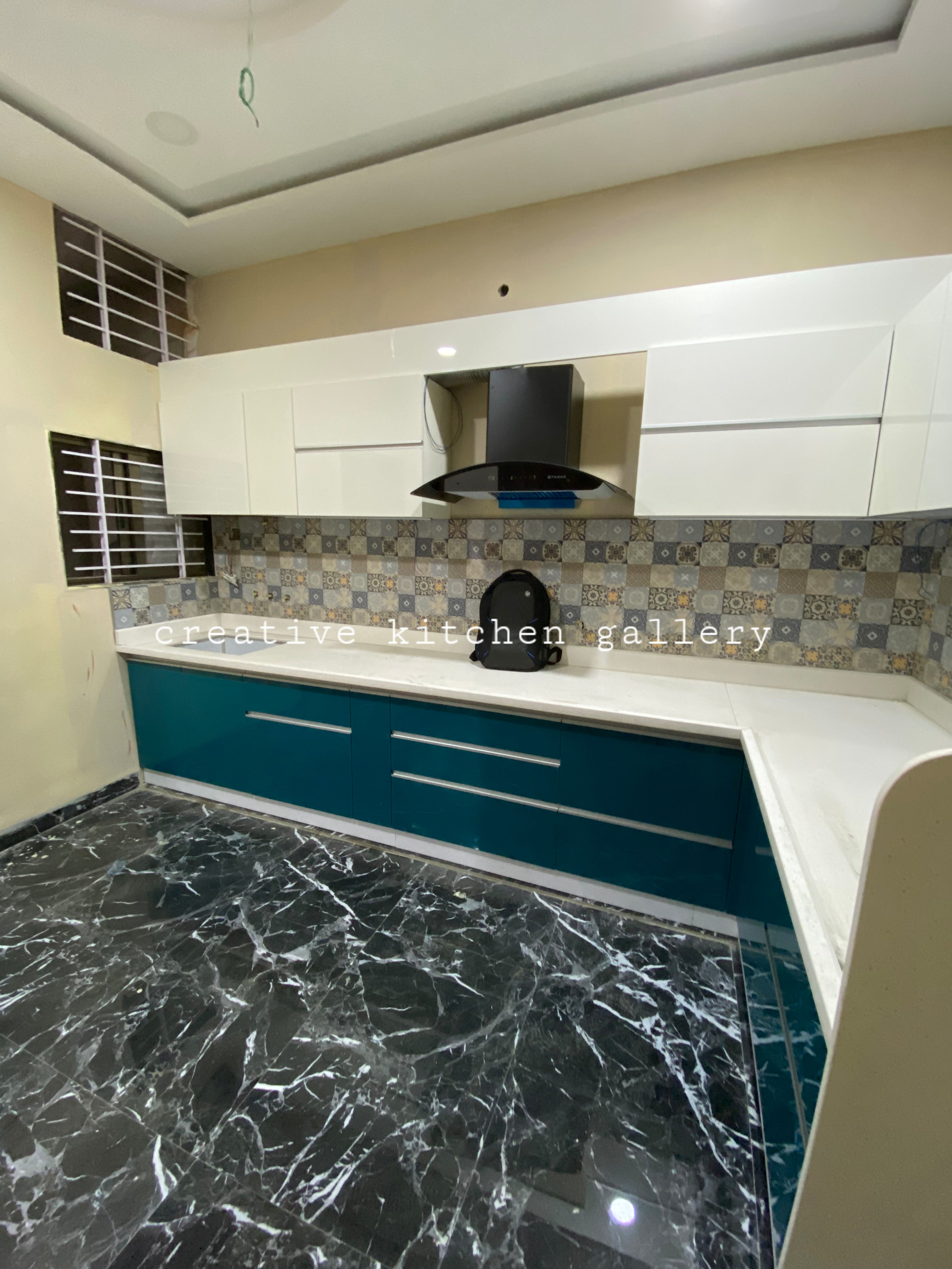 White and Dark Green L-Shaped Kitchen Design