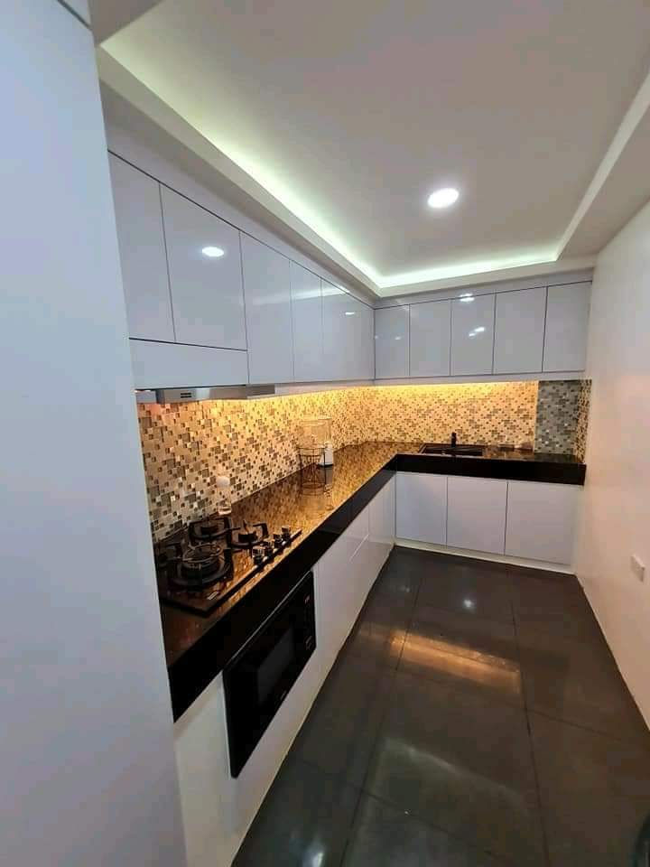 White and Black Color L Shape Modular Kitchen Design