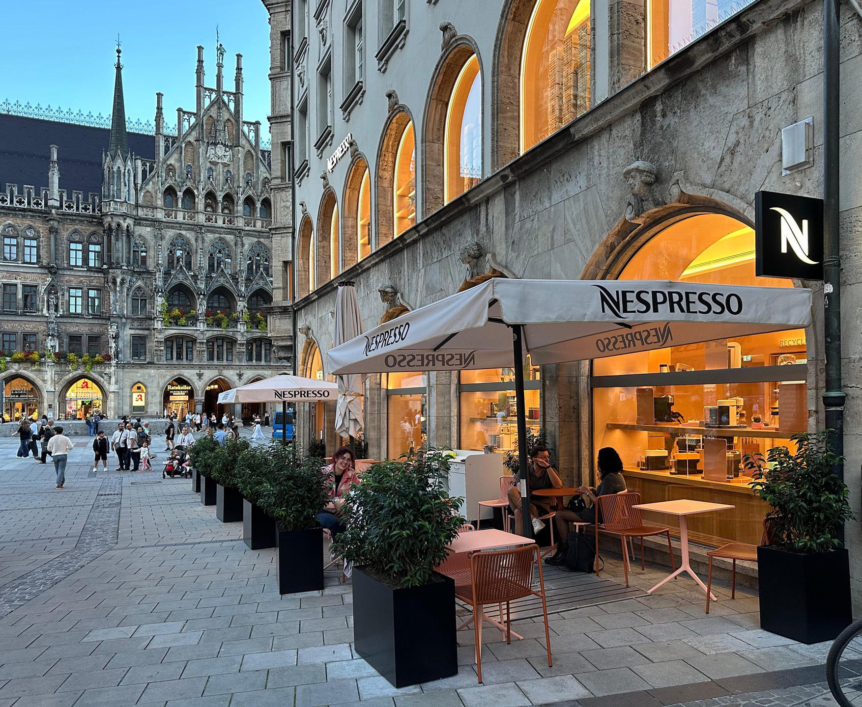 Coffee in the old town with white parasols