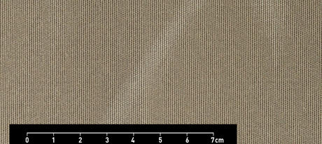 Brown textile with white stripes and measurements from 0 to 2.8 in