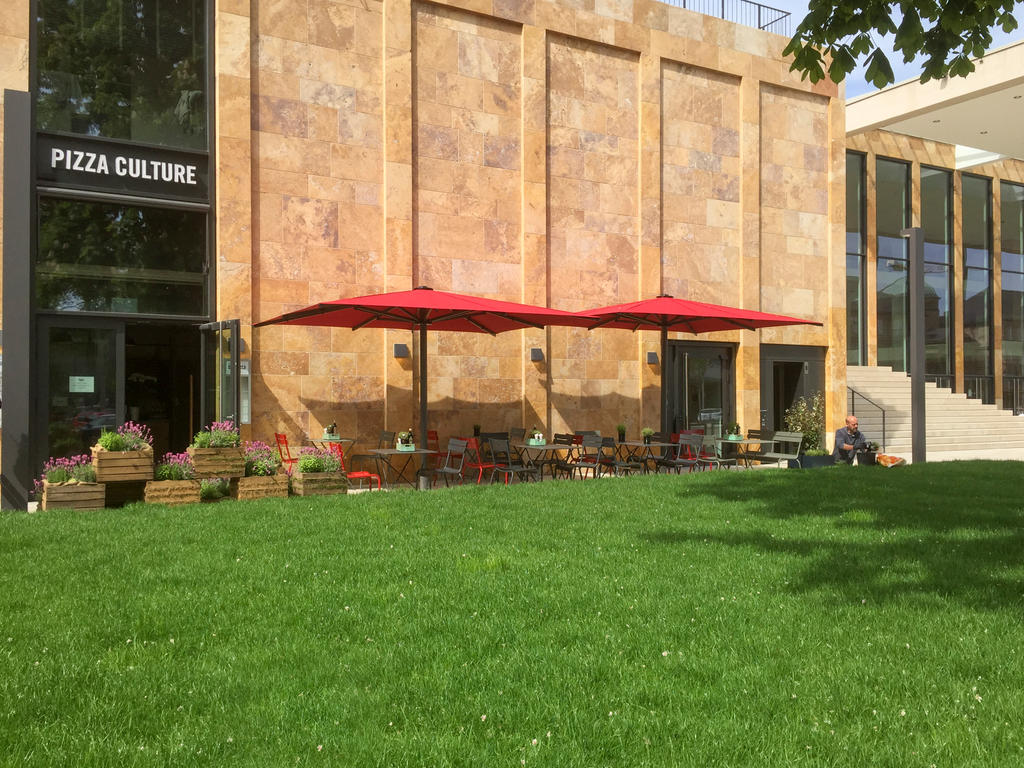 Patio with red parasols