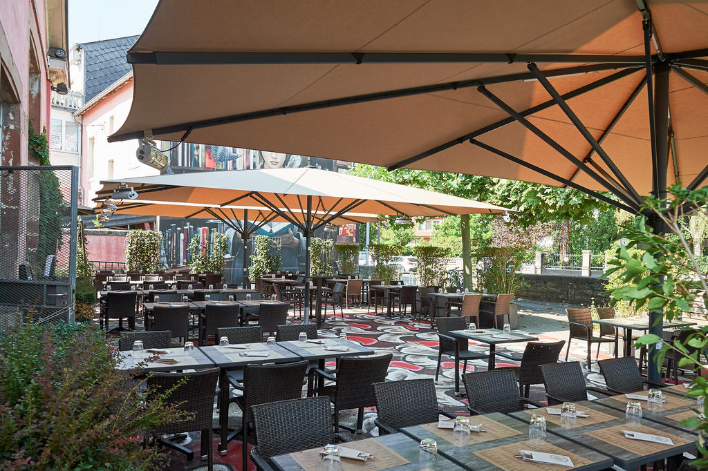 Patio with yellow parasols