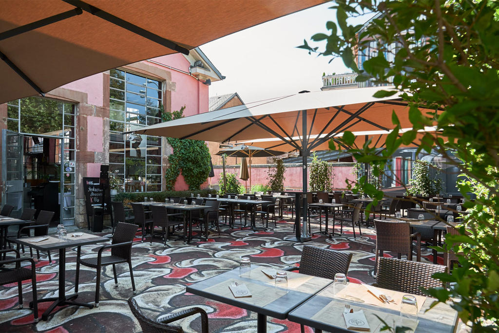 Patio with yellow parasols