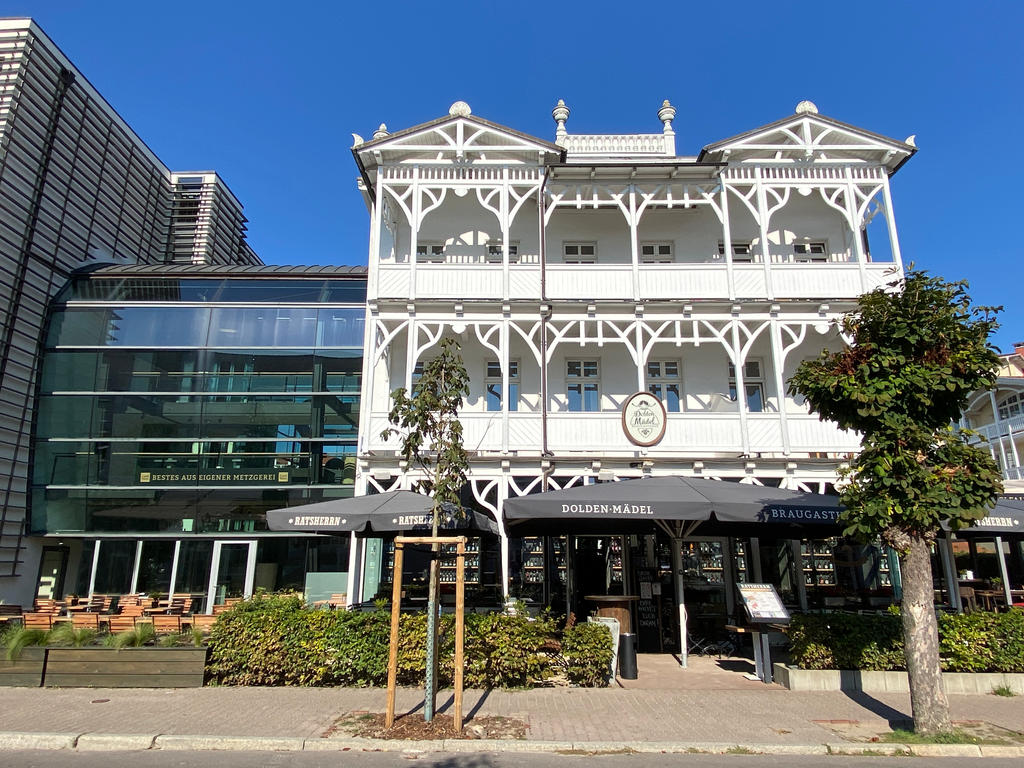 Brewery restaurant with dark-grey parasols