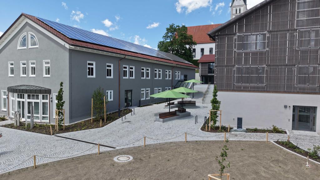 Municipal square with green parasols
