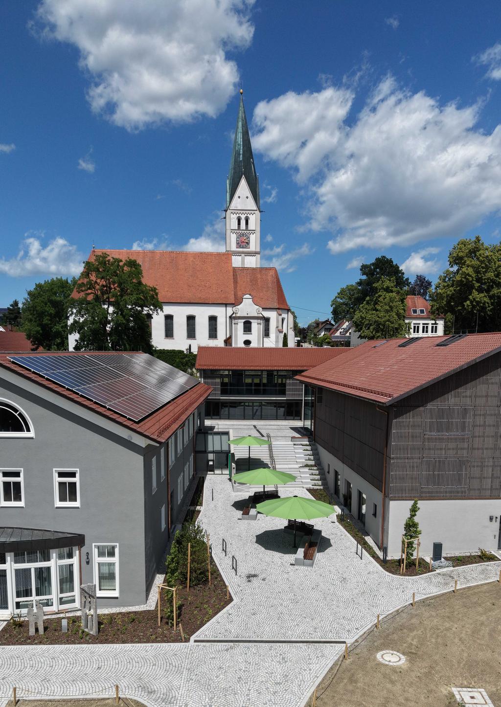 Municipal square with green parasols