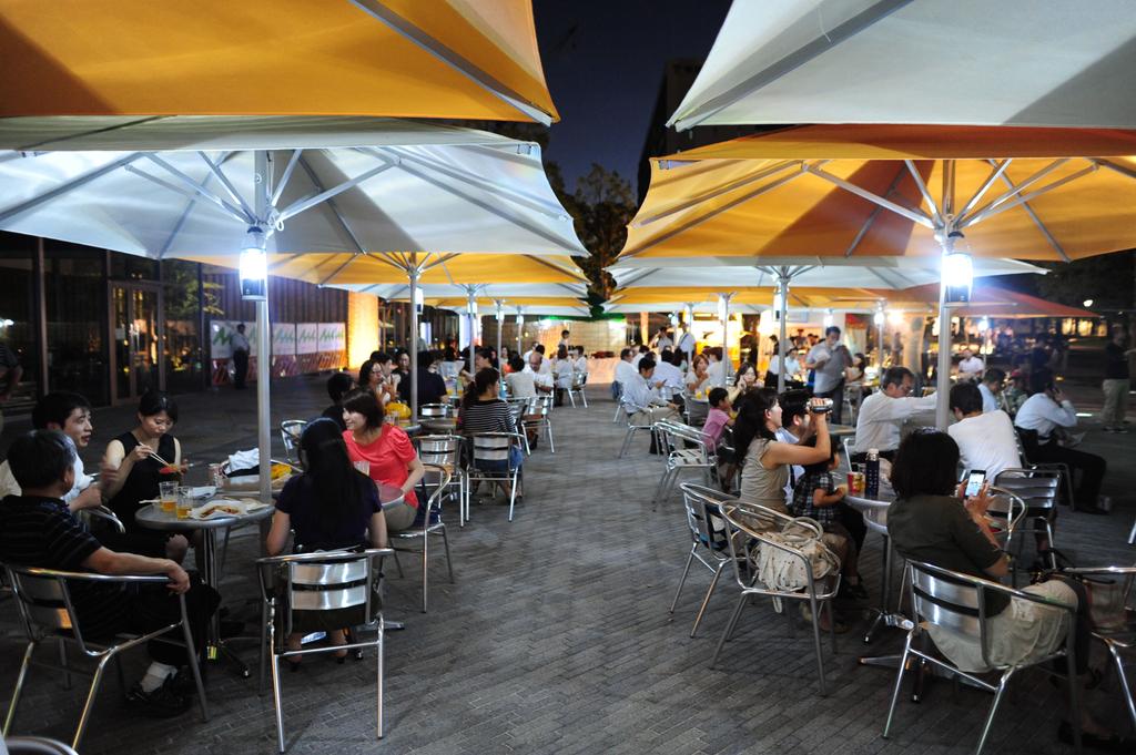 Many white and yellow parasols