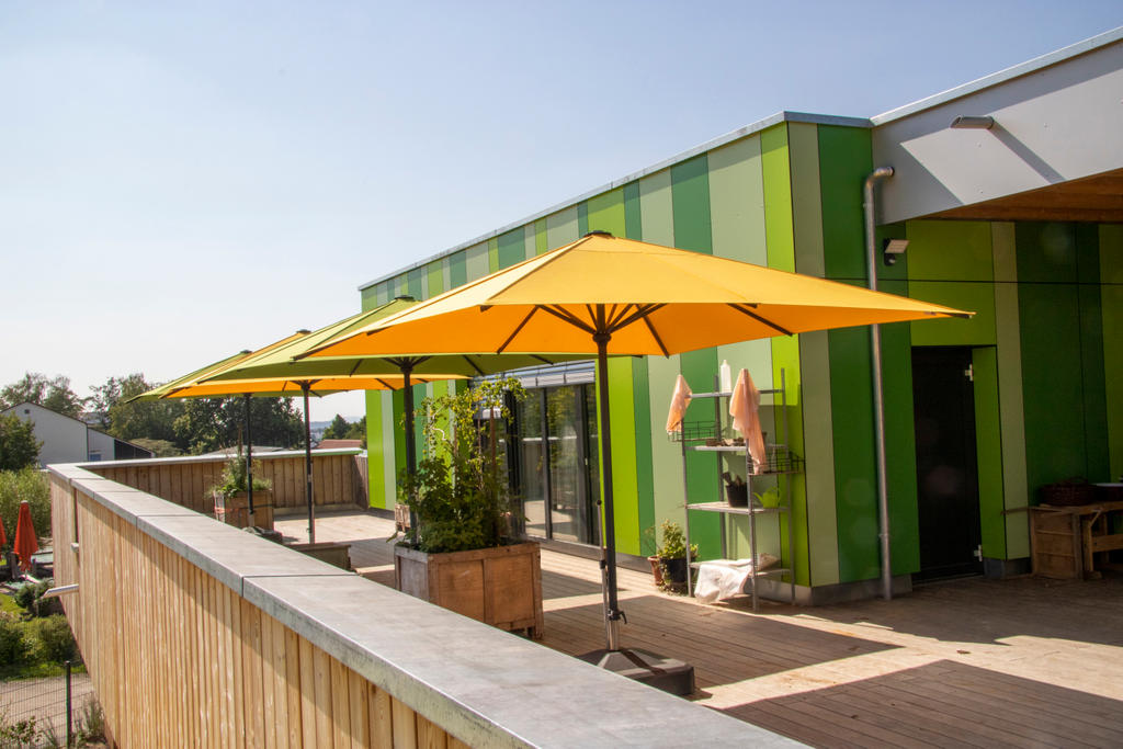 Kindergarden Lauerbäumle with green and yellow parasols